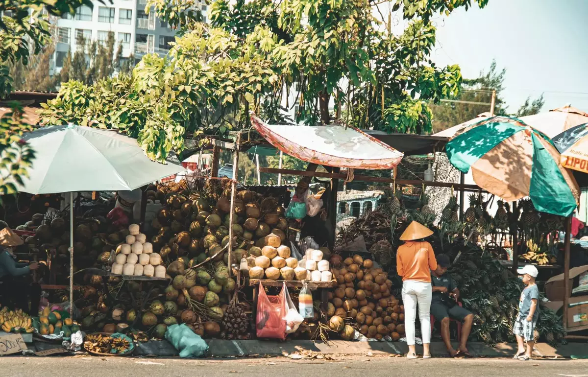 Mini floating local market in Saigon - AN Tours Vietnam
