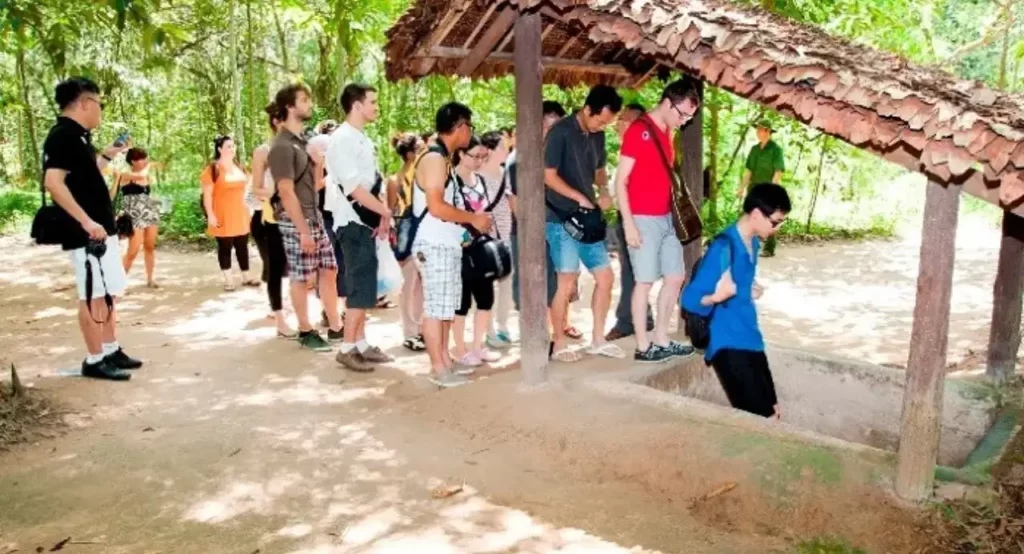 Cu Chi Tunnels are quite noisy and hot - AN Tours Vietnam