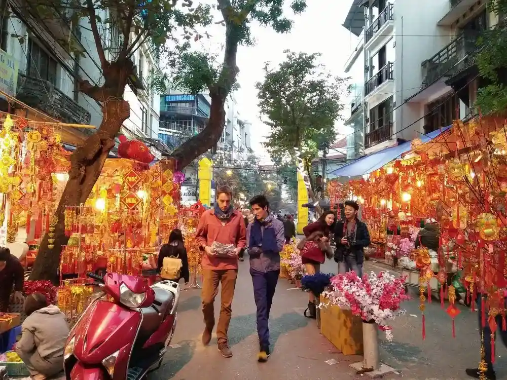 Explore the neighborhood where you live during the Tet - AN Tours Vietnam