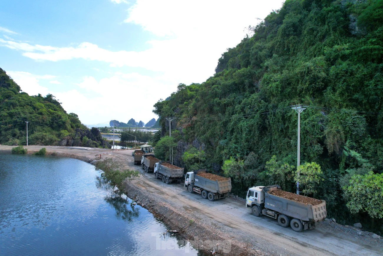 Trucks moving in and out the constructions on Ha Long Bay