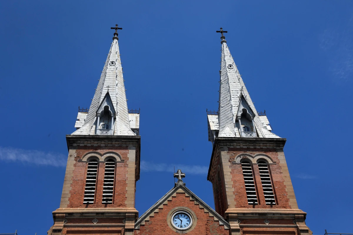 Bell towers and the clock of Notre Dame Cathedral of Saigon