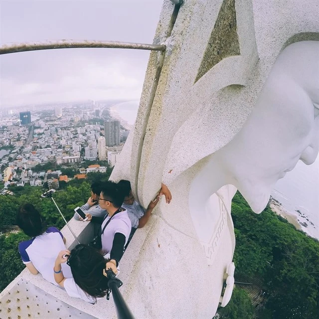 On the shoulder of Christ of Vung Tau Statue