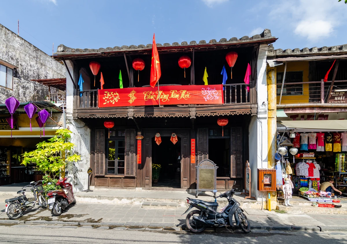 Timber balcony and historic facade of the Museum of Trade Ceramics on Tran Phu Street in Hoi An.