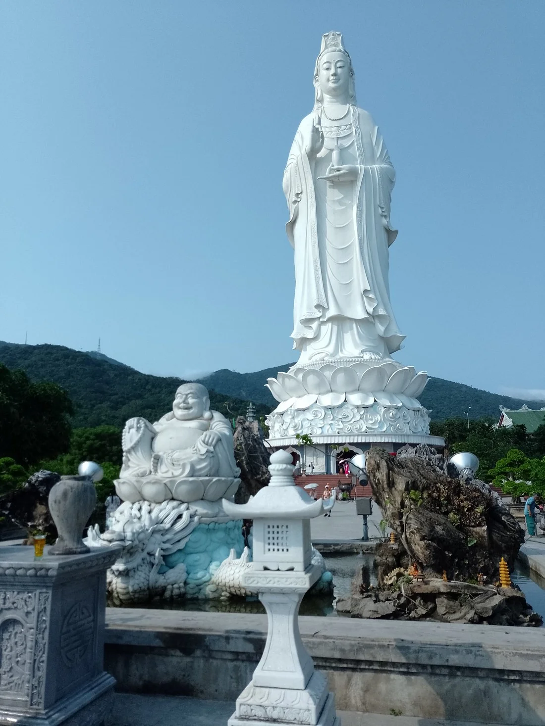 The white Lady Buddha statue on a lotus pedestal at Linh Ung Pagoda on Son Tra Peninsula, Da Nang.