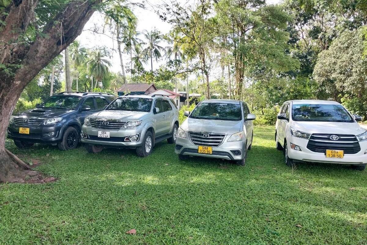 Illustrative private-transfer vehicles parked together outdoors